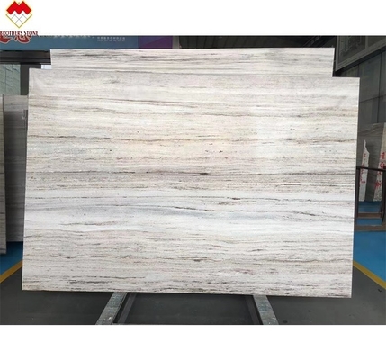 White Wood Look Marble Tiles Stair Follow Veins for a Versatile and Timeless Design