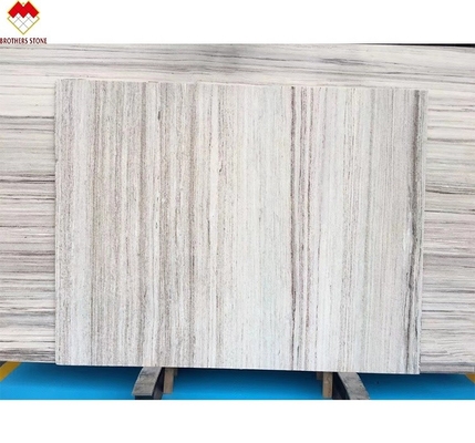 White Wood Look Marble Tiles Stair Follow Veins for a Versatile and Timeless Design