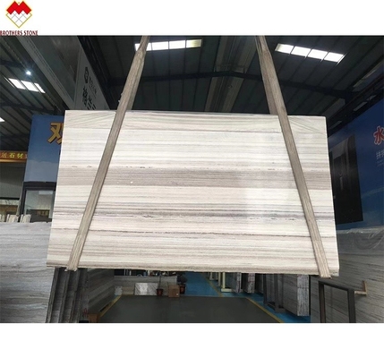 White Wood Look Marble Tiles Stair Follow Veins for a Versatile and Timeless Design