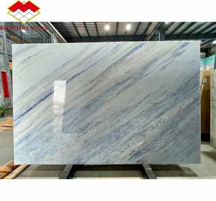 Upgrade Your Living Staircase Hall with 20mm Blue Ice Onyx Stone Veneer and Backlight